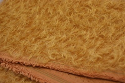 Mohair curled medium dense ± 23 mm pile, rust brown